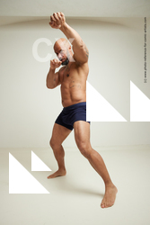 punching strong man ron 53