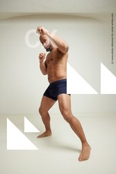 punching strong man ron 54