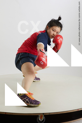 Woman Young Average Kneeling poses Sportswear Asian