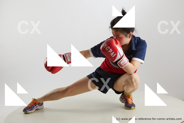 Woman Young Average Kneeling poses Sportswear Asian