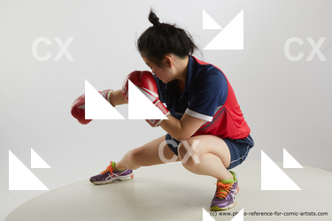 Woman Young Average Kneeling poses Sportswear Asian