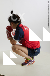 Woman Young Average Kneeling poses Sportswear Asian
