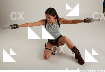01 Shrima Kneeling Pose With Guns