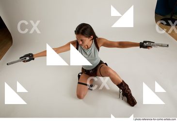 02 Shrima Kneeling Pose With Guns