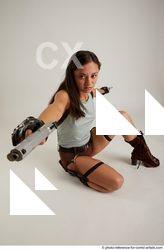 12 Shrima Kneeling Pose With Guns