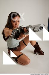 Woman Adult Average Fighting with gun Kneeling poses Casual Latino
