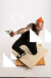 Edgar Kneeling Revolver Shooting 03