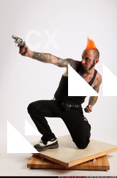 Edgar Kneeling Revolver Shooting 04