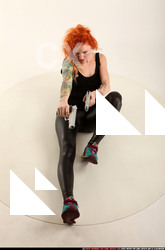 Woman Adult Average White Fighting with gun Laying poses Casual