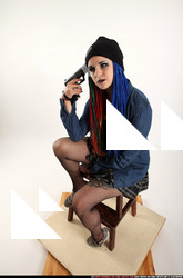 DOLORES SITTING PISTOL POSE 01 A