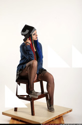 Woman Adult Average White Holding Sitting poses Casual