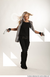 Woman Adult Athletic White Standing poses Casual Fighting with gun