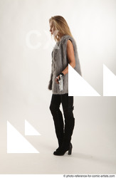 Woman Adult Athletic White Standing poses Casual Fighting with gun