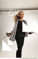 Woman Adult Athletic White Standing poses Casual Fighting with gun