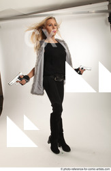 Woman Adult Athletic White Standing poses Casual Fighting with gun
