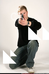 JANISONE KNEELING AIMING