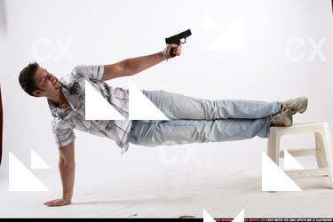 ROSTISLAV-POSE-JANISONE MERCENARY-PISTOL