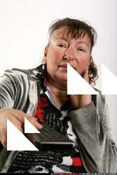 Paula-watching-tv-remote