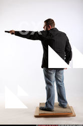 daniel-threatening-pistol