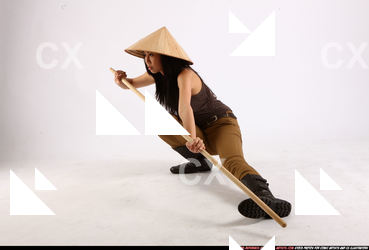 naomi-kneeling-stick-pose