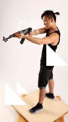 Jerald-mob-aiming-shooting-ak