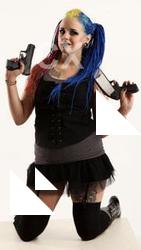 dolores-kneeling-pistol-shotgun