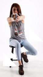 molly-sitting-aiming-pistol
