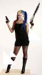 dolores-standing-pistol-shotgun