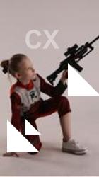 DENISA KNEELING POSE WITH GUN