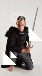 Claudio KNEELING POSE WITH SWORD