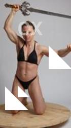 KAROLINA KNEELING WITH SWORD