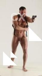 MICHAEL DIFFRENT POSES WITH GUN