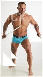 Fighting man with swords Garrott