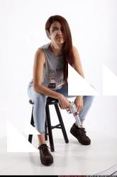Molly Sitting Pistol Pose