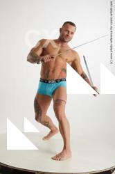 Garrott_Fighting_With_Swords