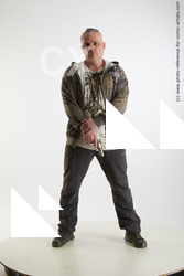 Yury Foghting Pose With Gun