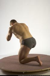 Man Young Muscular White Martial art Kneeling poses Underwear