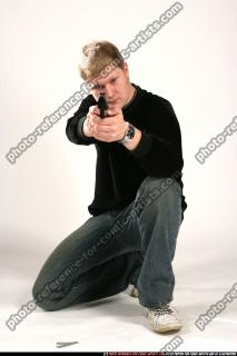 JANISONE KNEELING AIMING 03