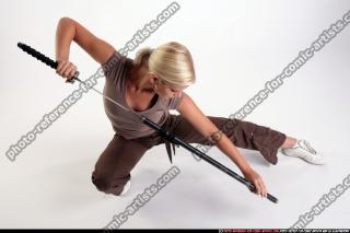 IVA UNSHEATHING KATANA 04.jpg