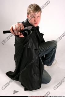 JANISONE KNEELING AIMING2