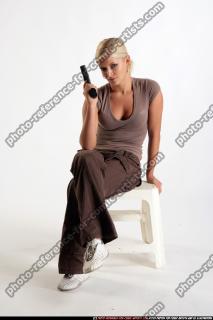 Iva decision female pistol sitting