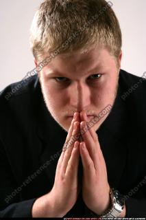 JANISONE DECISION PRAY CLOSE UP