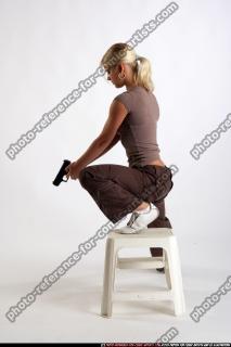 KNEELING ON CHAIR SHOOTINGDOWN PISTOL FEMALE 05.jpg