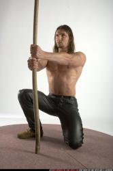 Man Adult Muscular White Martial art Kneeling poses Casual
