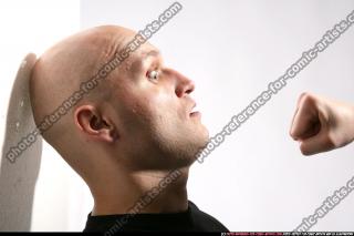 JAMESON FIST IN FRONT OF FACE 09