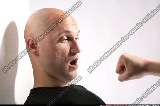 Jameson fist in front of face