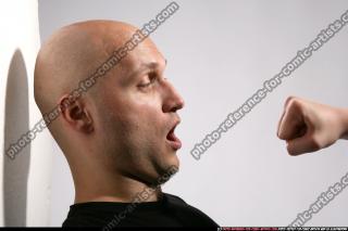 Jameson fist in front of face