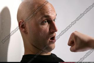 Jameson fist in front of face