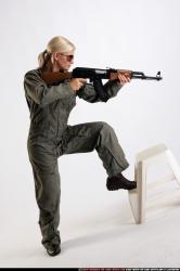 Woman Adult Athletic White Fighting with submachine gun Standing poses Army