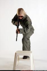Woman Adult Athletic White Fighting with submachine gun Standing poses Army